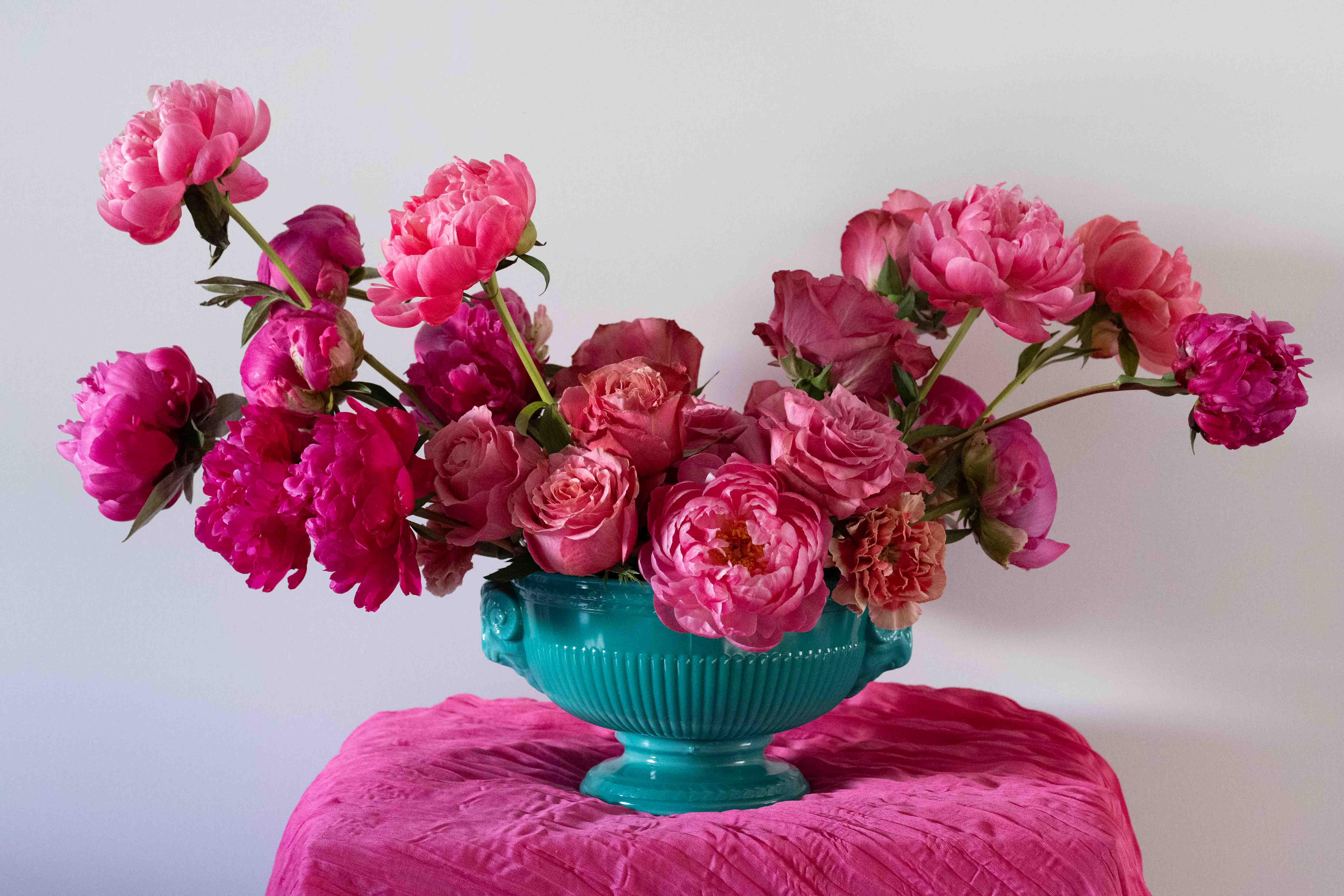 Falling for Winter Jewel Tones with Fuchsia Peonies & Roses in Teal Milk Glass